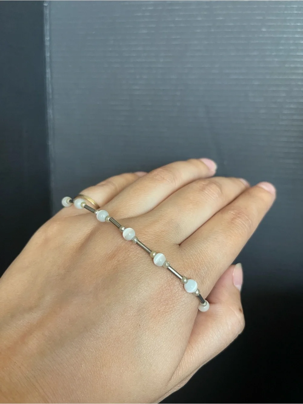 Silver tone bar and bead cat eye stone bracelet